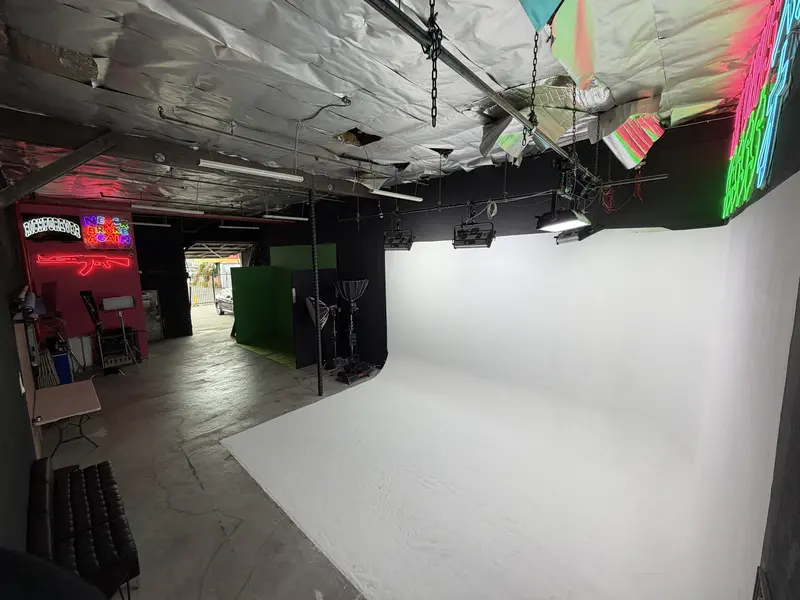 Wide view of Knows Studios creative workspace with neon accent lighting in North Hollywood